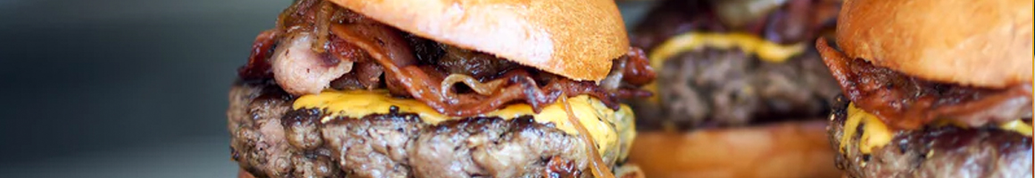 Eating Burger Fast Food at Quick Bite Carry Outs restaurant in Chicago, IL.